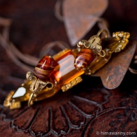 Amber Eye Art Glass Flower Brooch