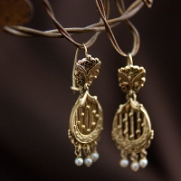 Earrings Designed With A Harp Played By A Goddess In Mythology