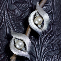 Trifari White Eyes Vintage Earrings