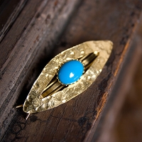 Florenza-Turquoise Cabochon Eye Barrette