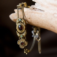 A Bracelet With Flower s, The Moon, And Leaves Swaying