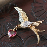 Kramer-Bird Brooch Carrying Hearts