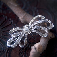 Trifari-Pave & Baguette Silver Rhinestone Ribbon Brooch