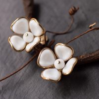 Trifari: Milk Glass Flower Vintage Earrings [Alfred Philippe]