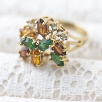 Uncas Vintage Ring: 18kt H.G.E Green Citrine Topaz Prong-Set with Clear Rhinestones